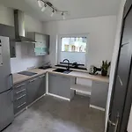 I U Ilony Feriegård *